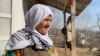 In the video, Shahboz Sharifbek accuses local officials of forcibly taking his brother from their home to enlist him in the army and beating his grandmother (pictured) in the process.