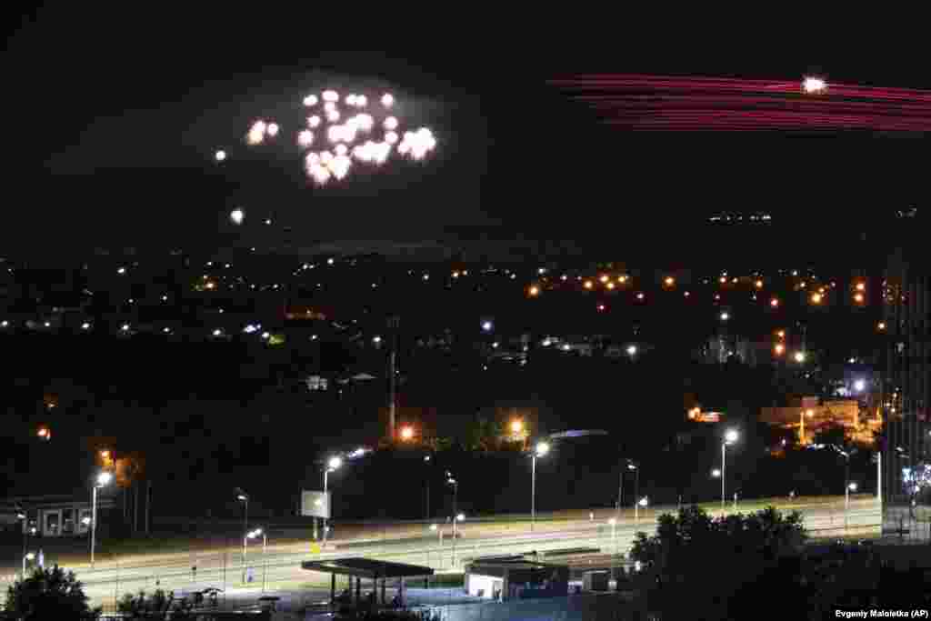 Ukrainian air defenses fire onto incoming Iranian-made drones during a Russian attack on Kyiv on May 30. Russia launched a fresh wave of drone attacks, killing at least one person and wounding several others, Ukrainian authorities said, adding that most of the drones were shot down by Ukraine&#39;s air defenses.