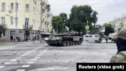 Members of Prigozhin's Wagner mercenary force are seen in southwestern Russia as they marched toward Moscow last year.