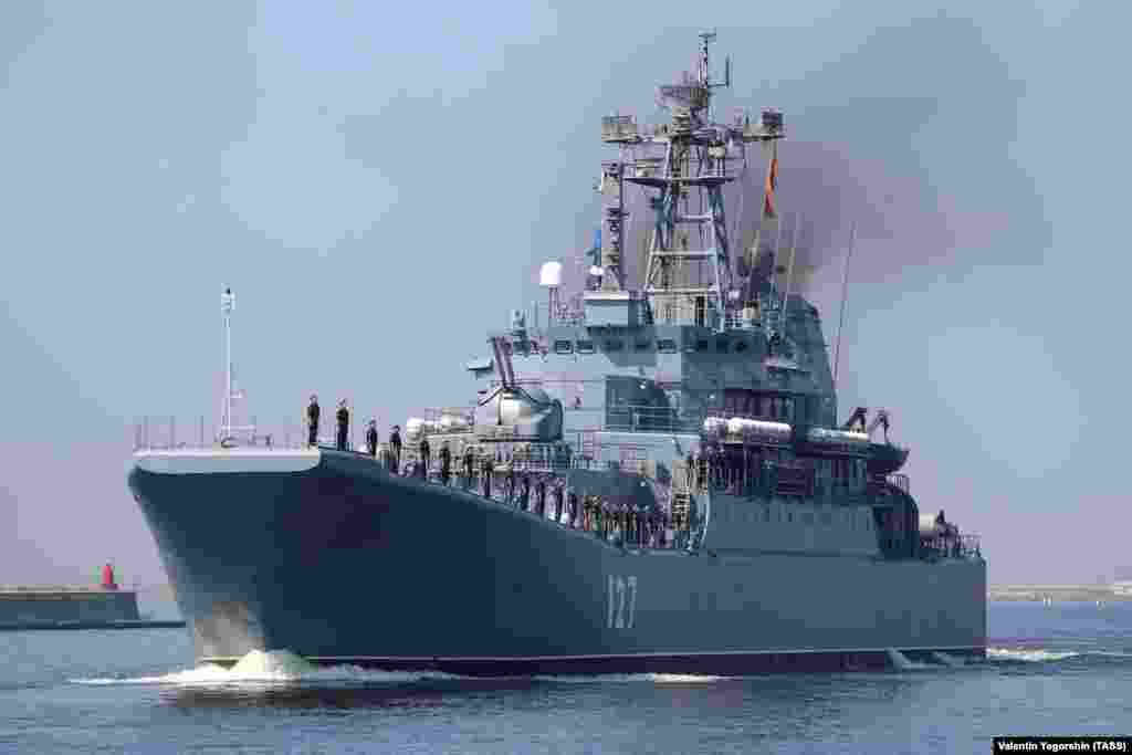 Russia’s Minsk, a Ropucha-class landing craft, cruises off the coast of St. Petersburg in July 2021. In September 2023, several missiles struck a shipyard in the Sevastopol naval base in Russian-occupied Crimea. According to Britain's Defense Ministry, the Minsk was almost certainly "functionally destroyed" in the strike. Photos of the aftermath showed the ship smoldering and severely damaged. The Minsk was built in Poland in 1983 and designed with a pop-open bow that could disgorge as many as 25 armored personnel carriers onto a beachhead. 