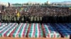 People attend the funeral ceremony on January 5 for casualties of the Islamic State attack in Kerman.