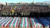 People attend the funeral ceremony of victims of the Islamic State attack in Kerman, Iran, on January 5.