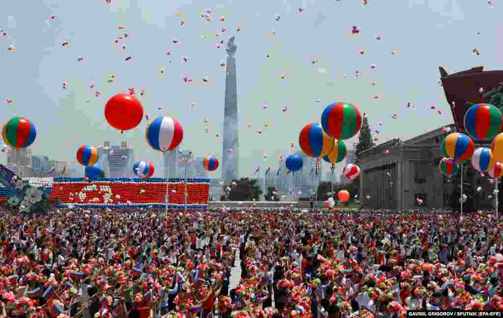 North Koreans attend a welcoming ceremony for Putin in Pyongyang on June 19. "We highly appreciate your consistent and unwavering support for Russian policy, including in the Ukrainian direction," Putin told Kim at the start of their talks, according to Russian media.