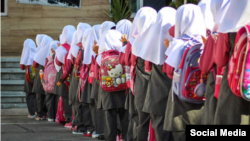 The hijab, or Islamic head scarf, became compulsory for women and girls over the age of 9 in 1981, two years after the Islamic Revolution in Iran. (file photo)