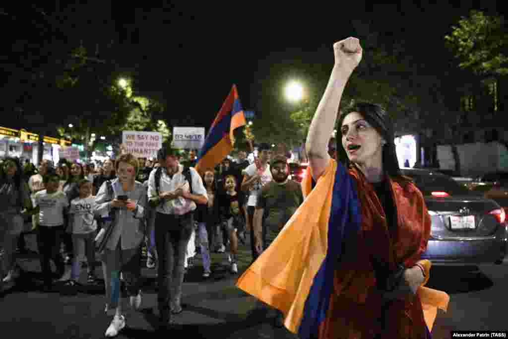 Protestors in Yerevan on July 25. A regional official inside Nagorno-Karabakh told journalists that the situation is becoming increasingly severe, with "no sugar, no cooking oil, no baby food, no candy," and added, "in terms of medication, it’s a matter of days before the reserves are depleted,” 