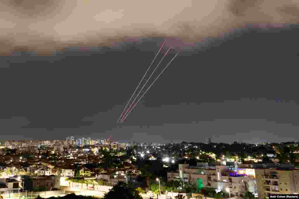 An anti-missile system operates after Iran launched drones and missiles towards Israel, as seen from Ashkelon, Israel.