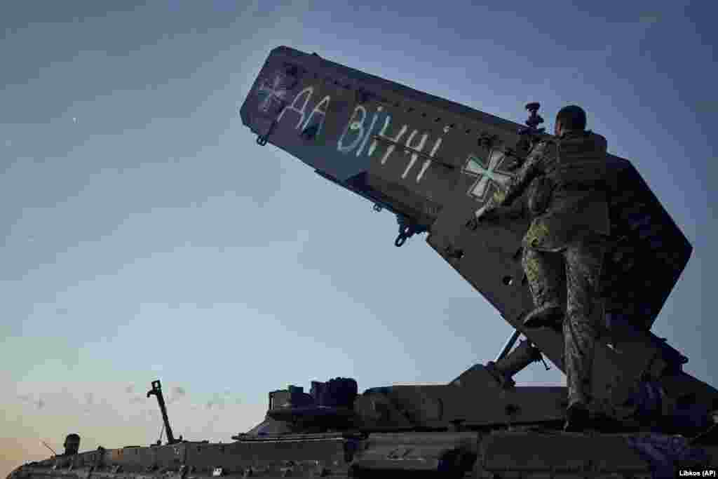 A Ukrainian soldier prepares the captured unit. The words "Da Vinci" are written on it in honor of the battalion commander, Dmytro Kotsyubaylo, who was killed in battle. Deputy Defense Minister Hanna Malyar said Ukrainian forces were consolidating gains made in the southern directions of Melitopol and Berdyansk, where "hot battles" are under way. 