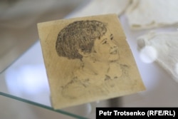 A hand-drawn portrait of a child