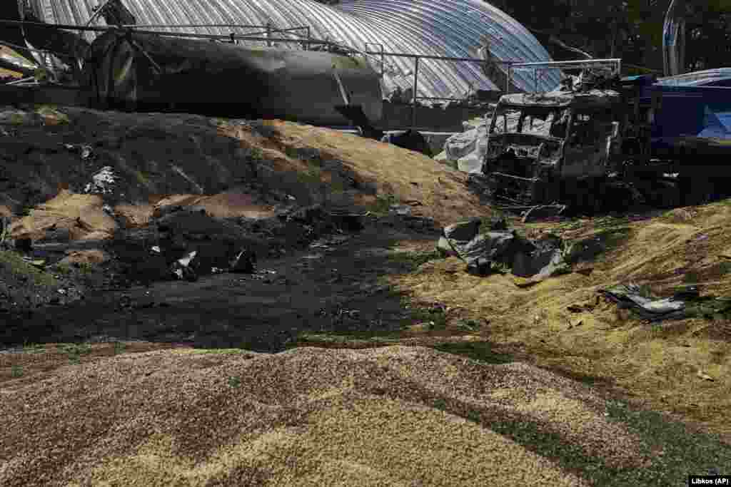 Two missiles hit a granary, causing a fire, and a third missile struck while firefighters were trying to extinguish the flames.