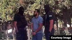 Olimjon Haidarov was arrested by masked security officers in July 2022.