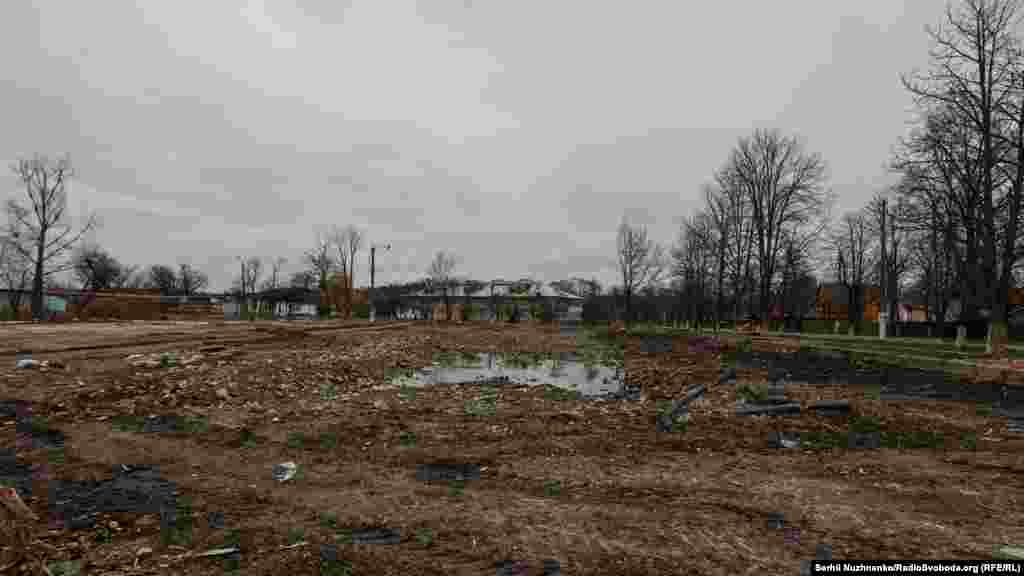These grounds, now vacant, once held a heavily damaged residential building.