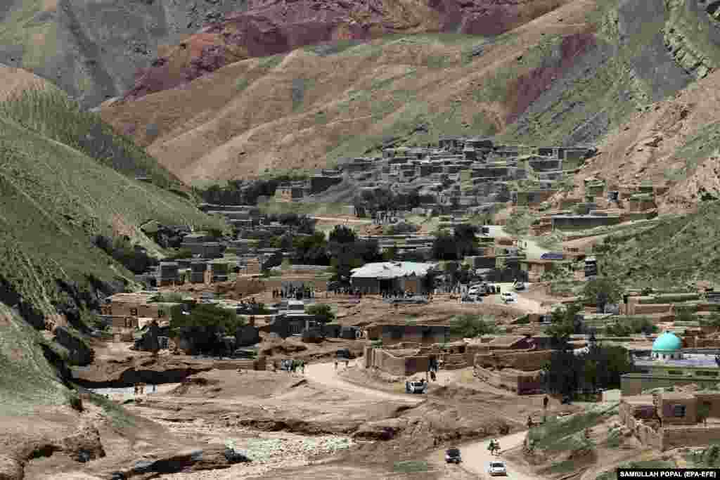A view of damaged homes following the flash flooding in the village of Shirjalal. Afghanistan is one of the world's most vulnerable countries when it comes to climate change and the least prepared to adapt, according to a report by the United Nations Office for the Coordination of Humanitarian Affairs (OCHA). 