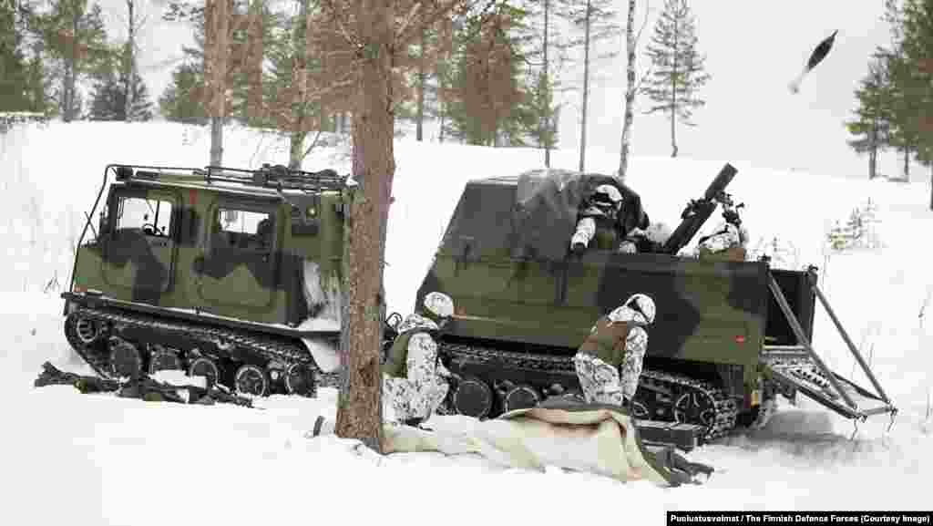 120 KHR TEKA Articulated Tracked Mortar Carrier The heavy mortar mounted inside a trailer for the Finnish-made “piglet” tracked vehicle allows a firing crew to lob a dozen mortar rounds in a minute, then escape into the wilderness before an adversary's battery radars can pinpoint their location. 