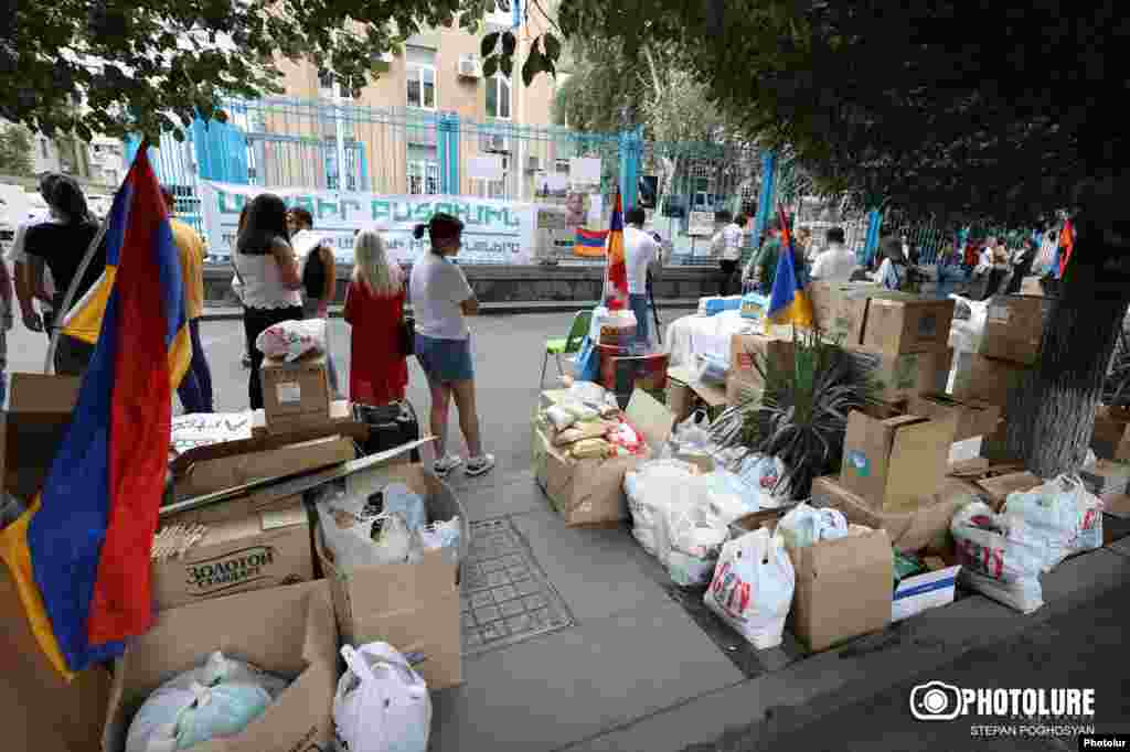 Piles of food outside the UN building in Yerevan. Vardanian adds, “It doesn’t even matter the political debates surrounding this specific territory, if there are people in need and they lack basic items like sugar or salt, it’s been the UN’s responsibility for decades to create a system of delivery.”