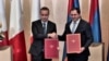 The defense ministers of Armenia and France take part in a joint press conference in Yerevan on February 23. 
