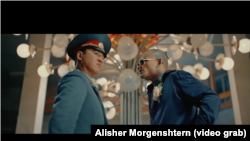 Morgernshtern (right) and Serik appear in the Russian hip-hop star's Black Russian video, shot at the Physics of the Sun Institute outside Tashkent.