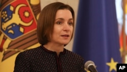 Modovan President Maia Sandu met with her American counterpart, Joe Biden, in Poland on February 21. (file photo)