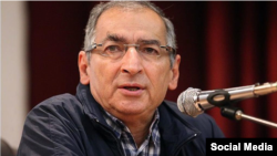 Iranian author and government critic Sadegh Zibakalam was arrested on the way to a book fair. (file photo)