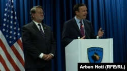 U.S. Senators Gary Peters (left) and Chris Murphy address a press conference in Pristina, Kosovo's capital on May 22.