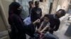 A health worker administers a polio vaccine to a child in Peshawar, Pakistan, on May 22.