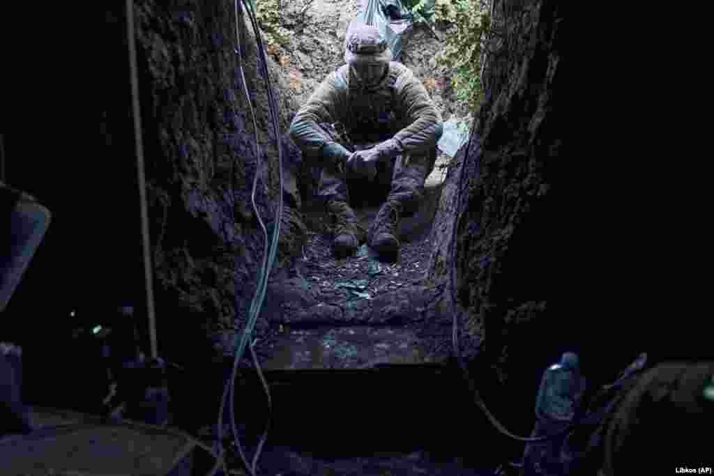 A Ukrainian soldier rests in a trench near Bakhmut on September 3. White House&nbsp;National Security Council spokesman John Kirby said on September 2 that &ldquo;we&rsquo;ve all seen the criticism by anonymous officials out there, which frankly is not helpful&rdquo; to Ukraine&rsquo;s battlefield effort.&quot;&nbsp; &nbsp;