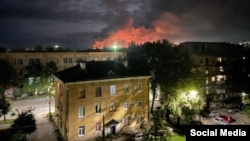 Smoke rises from a Russian airfield in the western region of Pskov after a suspected Ukrainian drone attack on August 30.