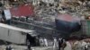 PHOTO GALLERY: Massive Landslide Buries Trucks, Kills At Least Two People In Pakistan