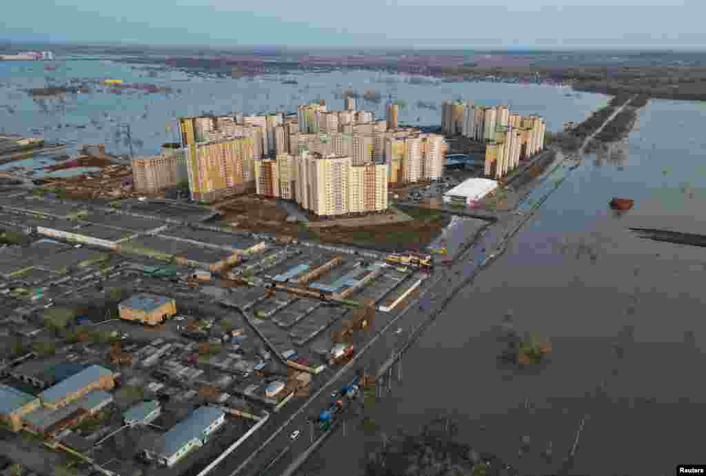 A drone view shows a flooded area around the Dubki residential complex in Orenburg, a city of half a million people. Russian officials in the Tyumen region of western Siberia and Kurgan in the south near the border with Kazakhstan on April 16 ordered more evacuations as the Ishim and Tobol rivers continued to swell. 