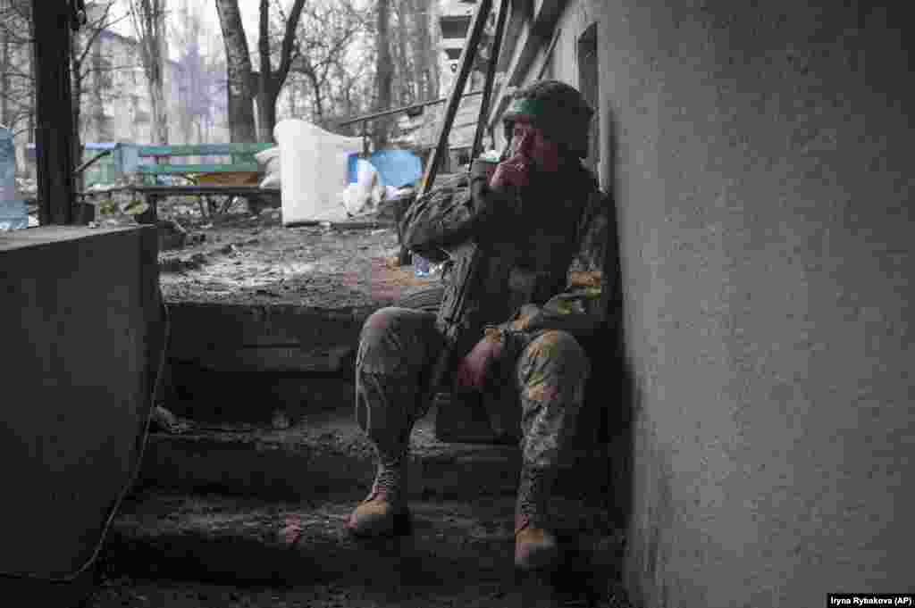 A Ukrainian soldier takes a cigarette break in Bakhmut on April 12. Ukrainian military spokesman Serhiy Cherevatyi told CNN on April 11 that Prighozhin’s claim of 80 percent control of the city is untrue. “I've just been in touch with the commander of one of the brigades that are defending the city. I can confidently state that the Ukrainian defense forces control a much larger percentage of the territory of Bakhmut," he said. 