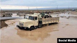 The floods were triggered by an intense rainfall that started earlier this week, inundating streets and sweeping away cars. (file photo)