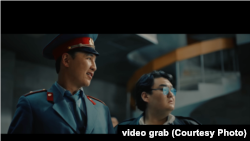 Sharip Serik and Zhenis Omarov in the Russian hip-hop star's Black Russian video