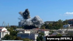 Smoke rises from Russia's Black Sea Fleet headquarters in the occupied port of Sevastopol in Crimea on September 22. 