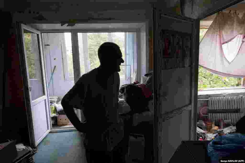 Journalists went back to Avdiyivka to check in on the pensioner. They found him living in his shattered apartment without windows. "My soul is at home; it's not trying to leave. I'm not anxious; I've become calm," Grozdov said.