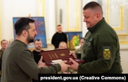 Valery Zaluzhniy (right), Ukraine's former top commander-in-chief, is popular among many Ukrainians and could be a challenger to Zelenskyy in an election.