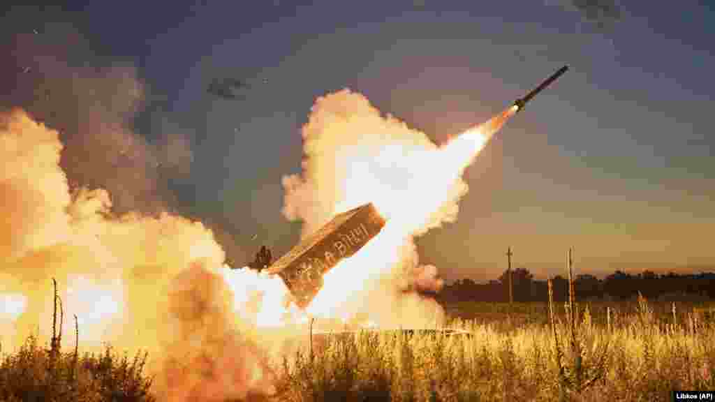 Ukrainian forces fire a TOS-1A Solntsepyok heavy thermobaric rocket launcher toward Russian positions near Kreminna, in the Luhansk region, on July 7. The Ukrainian Army's Da Vinci Battalion captured the weapon. Fierce battles are occurring in multiple locations on the front line as Kyiv continues its counteroffensive in the south, the military said on July 10.