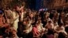Supporters of former Pakistani Prime Minister Imran Khan chant slogans as they protest his possible arrest, on March 14 in Karachi, Pakistan.