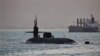 This photo released by the US Navy show a guided-missile submarine capable of carrying scores of Tomahawk missiles. 