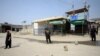 Pakistani security officials stand guard at the border on September 7 following clashes between security forces of Pakistan and Afghanistan near the Torkham crossing.