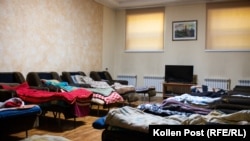 Overnight, the firefighters at Kharkiv's central firehouse are allowed to sleep in 2-hour shifts in narrow fold-out armchairs.
