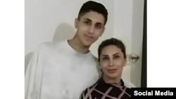 Mahsa Yazdani next to her son, Mohammad Javad Zahedi, a protester killed in the "Women, Life, Freedom" protests.