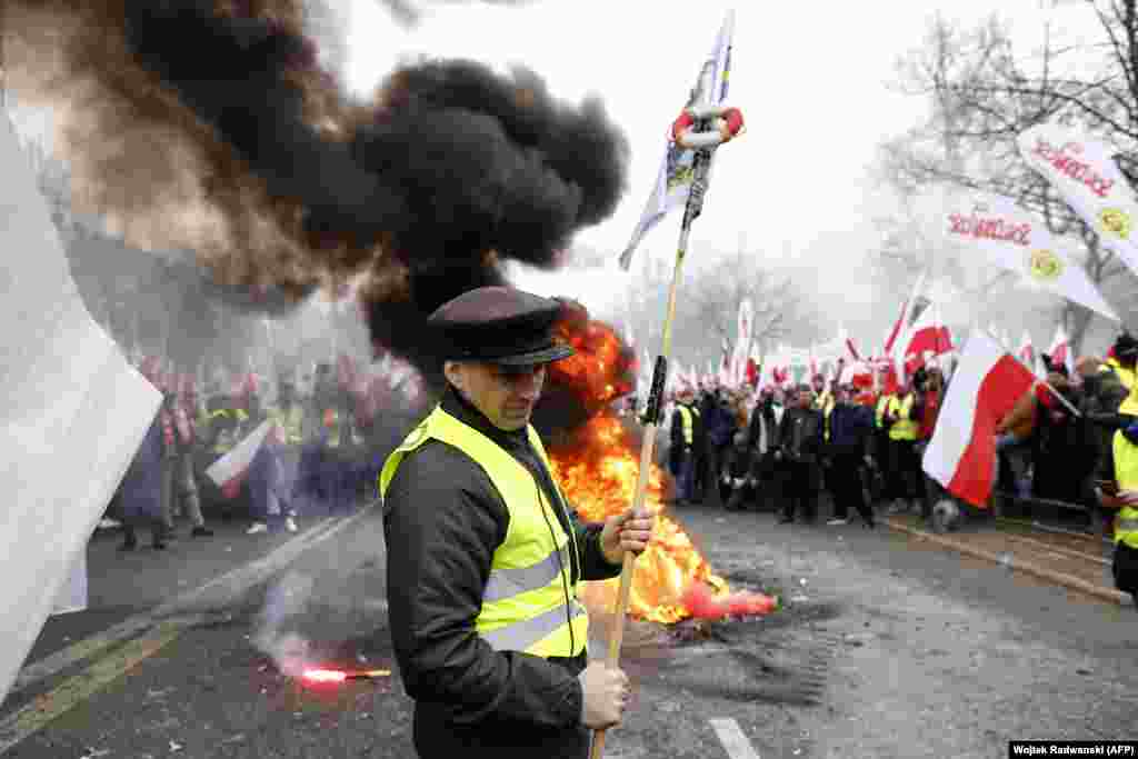 Farmers in Warsaw protest on March 6 against EU "Green Deal" measures, and duty-free imports of Ukrainian food to Poland. 