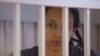 U.S. basketball player Brittney Griner sits inside a defendants' cage as she is given a nine-year prison sentence in Moscow on August 4.