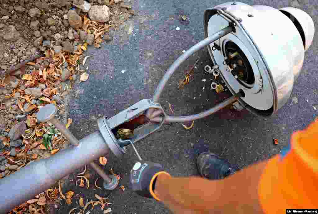 A worker dismantles a gas street lamp in Berlin on August 10.&nbsp; The Kremlin appears to be using its gas-powered leverage to pressure Germany over its support for Ukraine. Flows of Russian gas through the Nord Stream 1 pipeline were cut to less than 20 percent of capacity in July, with Russia&#39;s Gazprom citing &quot;equipment repairs&quot; for the strangled gas flow.&nbsp;