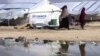 GRAB Wives Of Islamic State Militants Return To Tajikistan, But Where Are They?