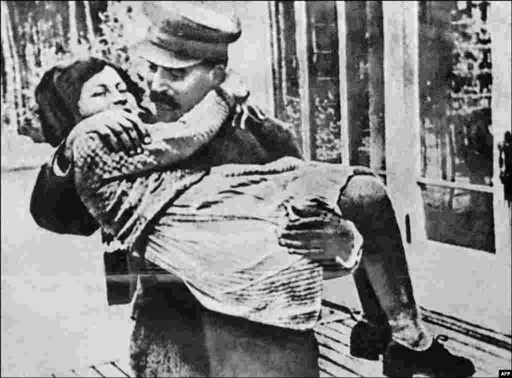 Josef Stalin and his daughter, Svetlana, in 1935. Svetlana was born in 1926, the daughter of Stalin and Nadezhda Alliluyeva. She defected to the United States in 1967, leaving two adult children in the Soviet Union. She returned to the USSR and lived in Tbilisi, Georgia, from 1984-86. She then returned to the United States, where she died of cancer in 2011.