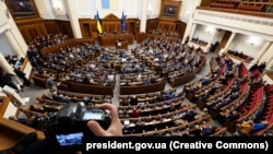 UKRAINE – President of Ukraine Volodymyr Zelenskyy at the rostrum of the Ukrainian Parliament during his speech with the annual message to the Verkhovna Rada. Kyiv, December 28, 2022