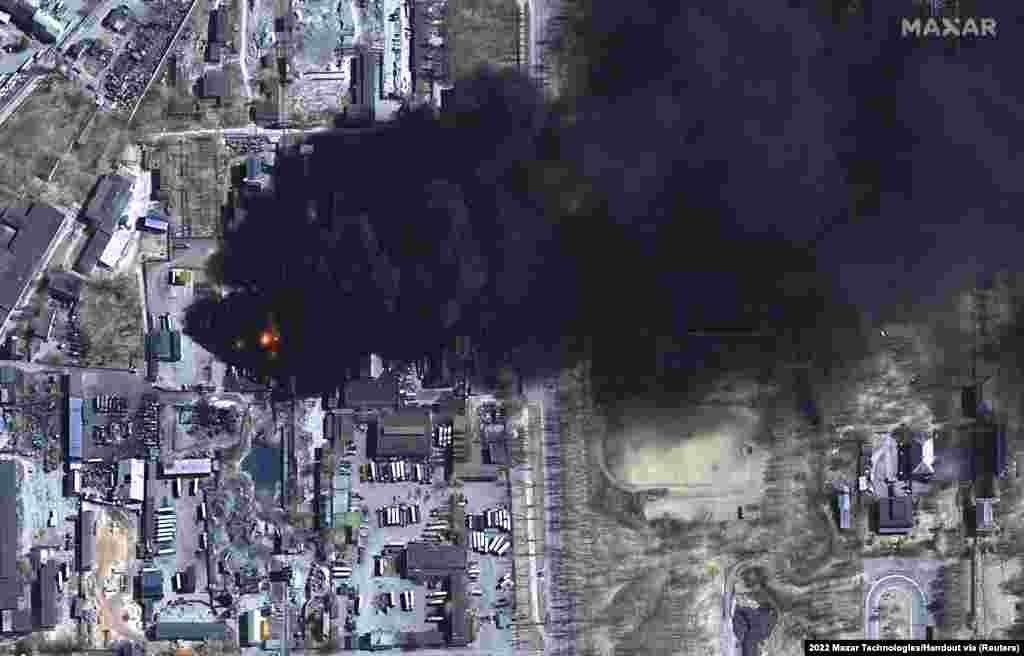Thick plumes of smoke rise from burning oil tanks in Chernihiv.