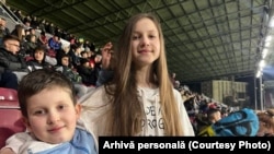 Horoshayeva's children at a fund-raising soccer match in Cluj.
