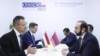 Hungarian Foreign Minister Peter Szijjarto (front left) and his Armenian counterpart, Ararat Mirzoyan (front right) meet in Lodz on December 1.
