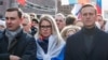 Aleksei Navalny (right) and Lyubov Sobol take part in a rally to mark the fifth anniversary of opposition politician Boris Nemtsov's assassination in Moscow on February 29.